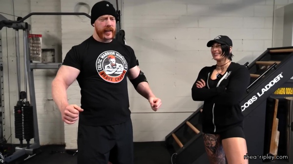 Rhea_Ripley_flexes_on_Sheamus_with_her__Nightmare__Arms_workout_2358.jpg