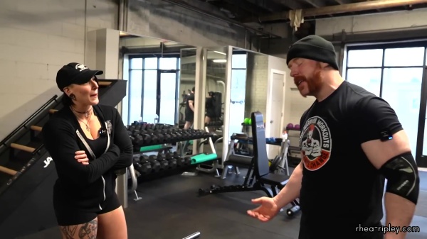 Rhea_Ripley_flexes_on_Sheamus_with_her__Nightmare__Arms_workout_2390.jpg
