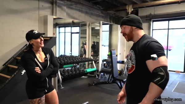 Rhea_Ripley_flexes_on_Sheamus_with_her__Nightmare__Arms_workout_2391.jpg