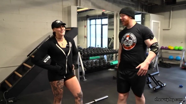 Rhea_Ripley_flexes_on_Sheamus_with_her__Nightmare__Arms_workout_2418.jpg