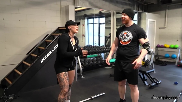 Rhea_Ripley_flexes_on_Sheamus_with_her__Nightmare__Arms_workout_2422.jpg