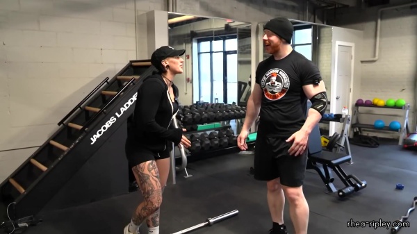 Rhea_Ripley_flexes_on_Sheamus_with_her__Nightmare__Arms_workout_2423.jpg