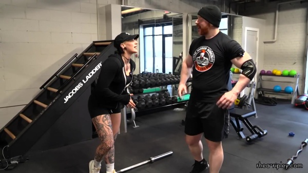 Rhea_Ripley_flexes_on_Sheamus_with_her__Nightmare__Arms_workout_2425.jpg