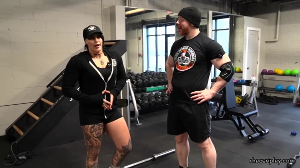 Rhea_Ripley_flexes_on_Sheamus_with_her__Nightmare__Arms_workout_2429.jpg