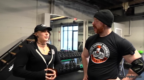 Rhea_Ripley_flexes_on_Sheamus_with_her__Nightmare__Arms_workout_2440.jpg