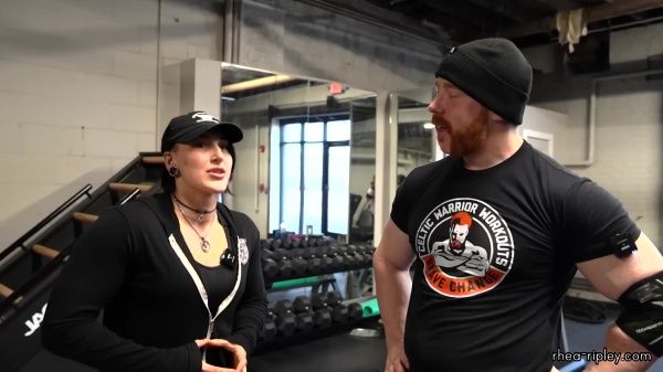 Rhea_Ripley_flexes_on_Sheamus_with_her__Nightmare__Arms_workout_2441.jpg