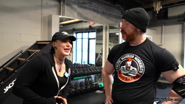 Rhea_Ripley_flexes_on_Sheamus_with_her__Nightmare__Arms_workout_2442.jpg
