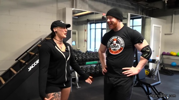 Rhea_Ripley_flexes_on_Sheamus_with_her__Nightmare__Arms_workout_2482.jpg