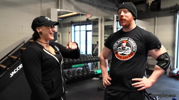 Rhea_Ripley_flexes_on_Sheamus_with_her__Nightmare__Arms_workout_2491.jpg