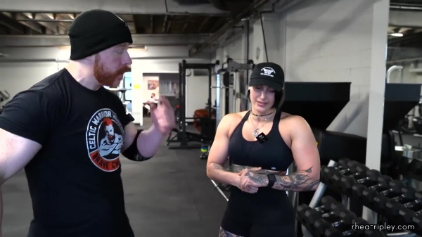 Rhea_Ripley_flexes_on_Sheamus_with_her__Nightmare__Arms_workout_2617.jpg