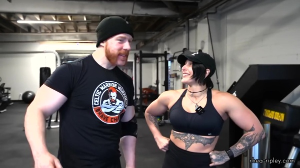 Rhea_Ripley_flexes_on_Sheamus_with_her__Nightmare__Arms_workout_2690.jpg