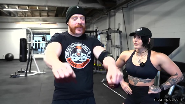 Rhea_Ripley_flexes_on_Sheamus_with_her__Nightmare__Arms_workout_2705.jpg