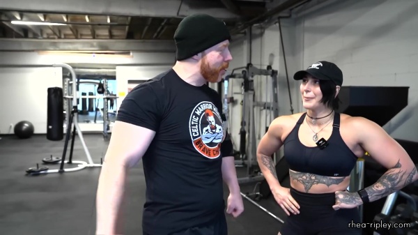 Rhea_Ripley_flexes_on_Sheamus_with_her__Nightmare__Arms_workout_2707.jpg
