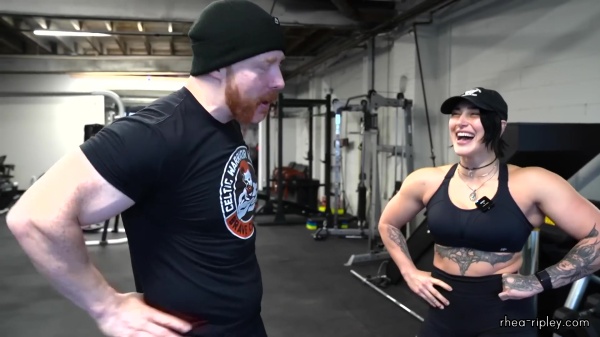 Rhea_Ripley_flexes_on_Sheamus_with_her__Nightmare__Arms_workout_2710.jpg