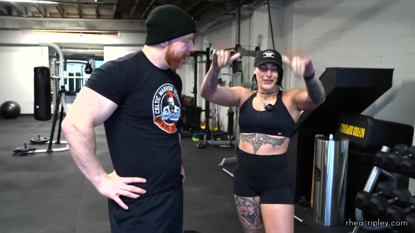 Rhea_Ripley_flexes_on_Sheamus_with_her__Nightmare__Arms_workout_2717.jpg
