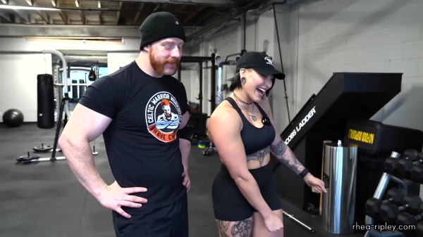 Rhea_Ripley_flexes_on_Sheamus_with_her__Nightmare__Arms_workout_2737.jpg