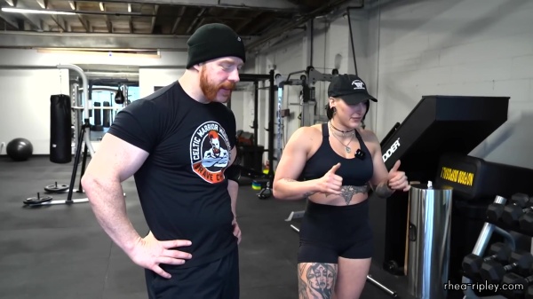 Rhea_Ripley_flexes_on_Sheamus_with_her__Nightmare__Arms_workout_2745.jpg