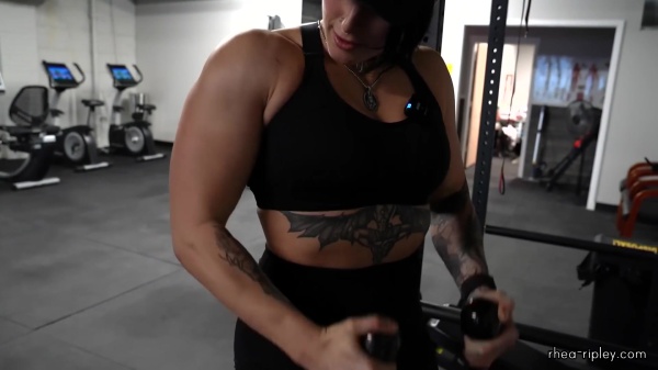 Rhea_Ripley_flexes_on_Sheamus_with_her__Nightmare__Arms_workout_3087.jpg