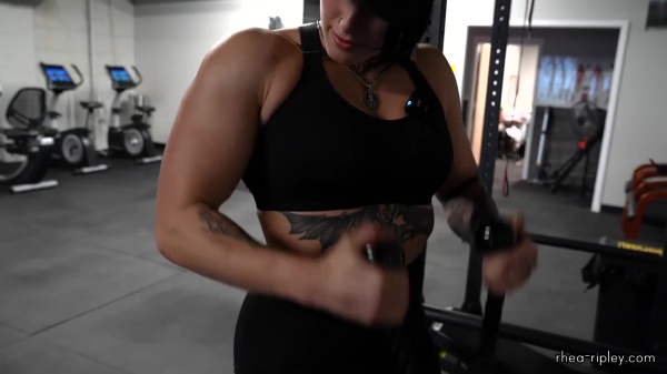 Rhea_Ripley_flexes_on_Sheamus_with_her__Nightmare__Arms_workout_3089.jpg