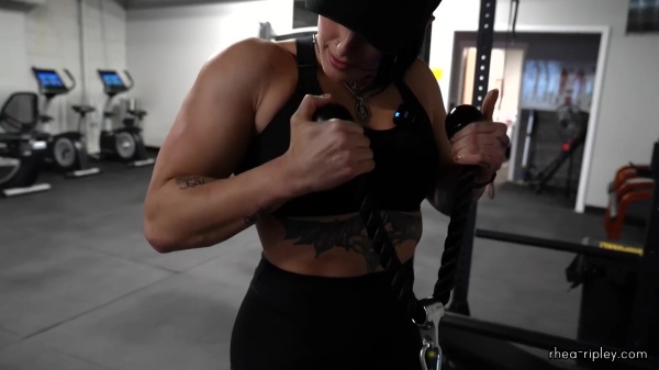 Rhea_Ripley_flexes_on_Sheamus_with_her__Nightmare__Arms_workout_3091.jpg
