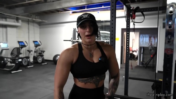 Rhea_Ripley_flexes_on_Sheamus_with_her__Nightmare__Arms_workout_3100.jpg