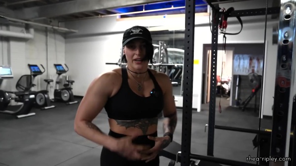 Rhea_Ripley_flexes_on_Sheamus_with_her__Nightmare__Arms_workout_3101.jpg