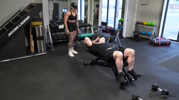 Rhea_Ripley_flexes_on_Sheamus_with_her__Nightmare__Arms_workout_3113.jpg