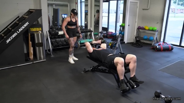 Rhea_Ripley_flexes_on_Sheamus_with_her__Nightmare__Arms_workout_3114.jpg