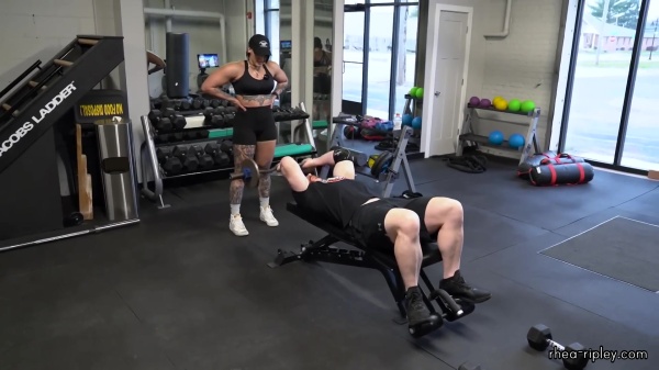 Rhea_Ripley_flexes_on_Sheamus_with_her__Nightmare__Arms_workout_3121.jpg