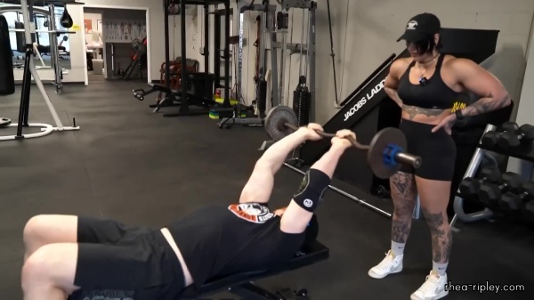 Rhea_Ripley_flexes_on_Sheamus_with_her__Nightmare__Arms_workout_3132.jpg