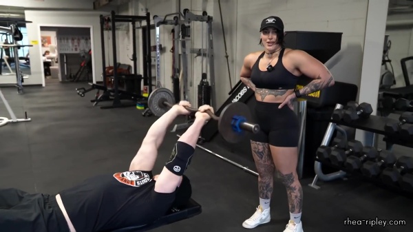 Rhea_Ripley_flexes_on_Sheamus_with_her__Nightmare__Arms_workout_3141.jpg