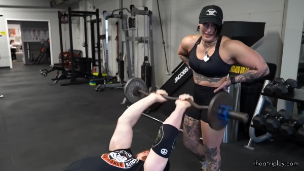 Rhea_Ripley_flexes_on_Sheamus_with_her__Nightmare__Arms_workout_3150.jpg