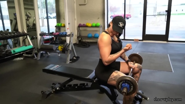Rhea_Ripley_flexes_on_Sheamus_with_her__Nightmare__Arms_workout_3255.jpg