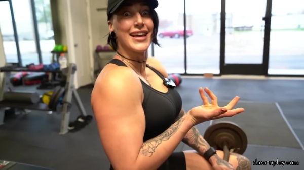 Rhea_Ripley_flexes_on_Sheamus_with_her__Nightmare__Arms_workout_3260.jpg