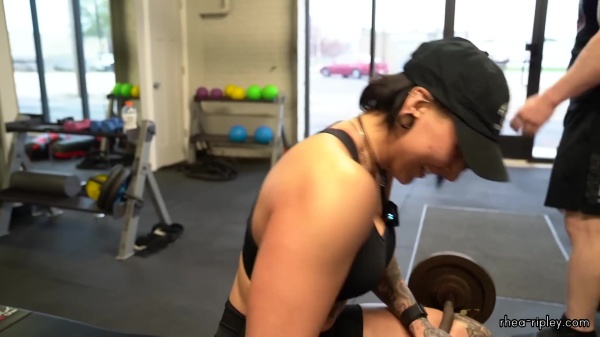 Rhea_Ripley_flexes_on_Sheamus_with_her__Nightmare__Arms_workout_3264.jpg