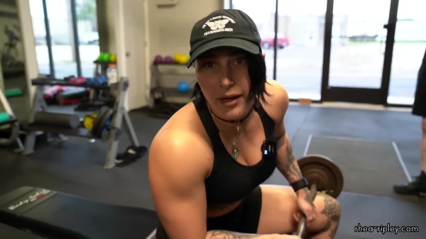 Rhea_Ripley_flexes_on_Sheamus_with_her__Nightmare__Arms_workout_3268.jpg