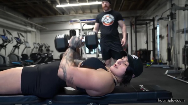 Rhea_Ripley_flexes_on_Sheamus_with_her__Nightmare__Arms_workout_3450.jpg