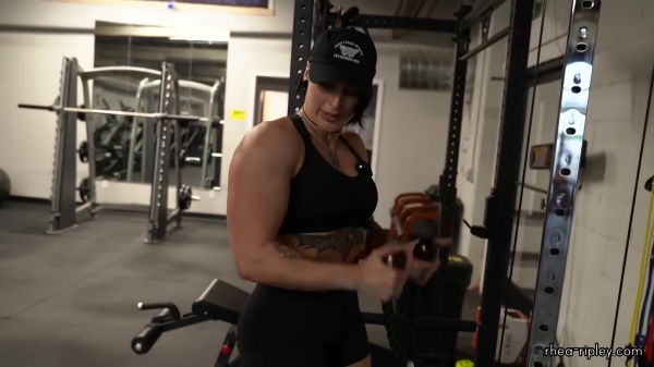 Rhea_Ripley_flexes_on_Sheamus_with_her__Nightmare__Arms_workout_3465.jpg