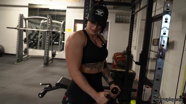 Rhea_Ripley_flexes_on_Sheamus_with_her__Nightmare__Arms_workout_3466.jpg