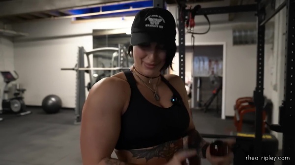 Rhea_Ripley_flexes_on_Sheamus_with_her__Nightmare__Arms_workout_3474.jpg