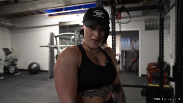 Rhea_Ripley_flexes_on_Sheamus_with_her__Nightmare__Arms_workout_3480.jpg