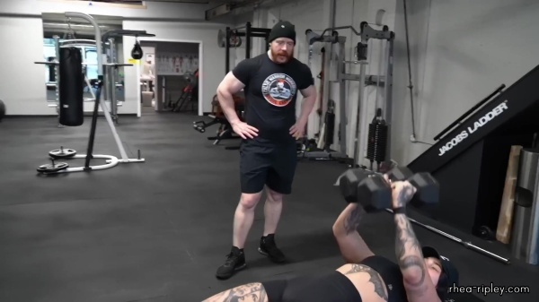 Rhea_Ripley_flexes_on_Sheamus_with_her__Nightmare__Arms_workout_3563.jpg