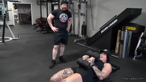 Rhea_Ripley_flexes_on_Sheamus_with_her__Nightmare__Arms_workout_3568.jpg