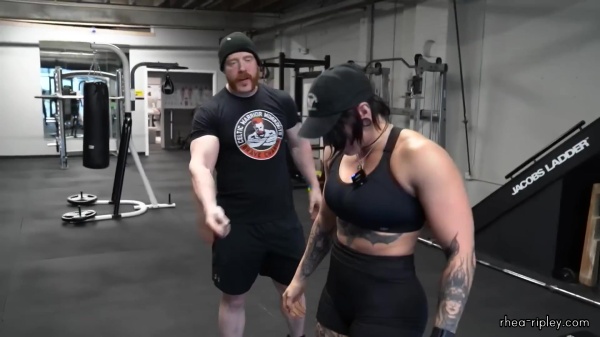 Rhea_Ripley_flexes_on_Sheamus_with_her__Nightmare__Arms_workout_3578.jpg