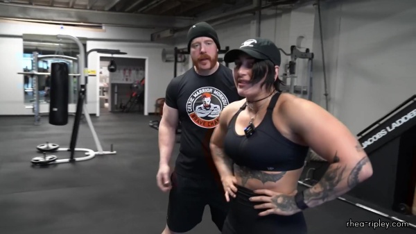 Rhea_Ripley_flexes_on_Sheamus_with_her__Nightmare__Arms_workout_3582.jpg