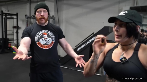 Rhea_Ripley_flexes_on_Sheamus_with_her__Nightmare__Arms_workout_3592.jpg