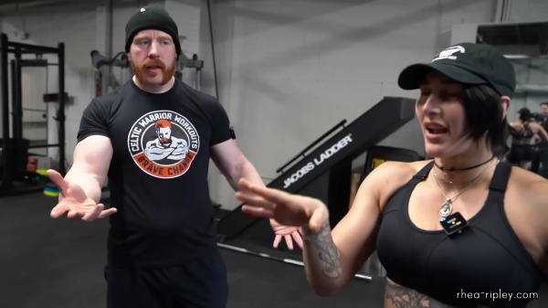 Rhea_Ripley_flexes_on_Sheamus_with_her__Nightmare__Arms_workout_3593.jpg