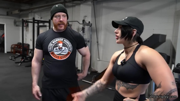 Rhea_Ripley_flexes_on_Sheamus_with_her__Nightmare__Arms_workout_3626.jpg