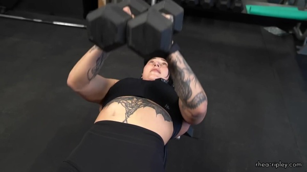 Rhea_Ripley_flexes_on_Sheamus_with_her__Nightmare__Arms_workout_3764.jpg