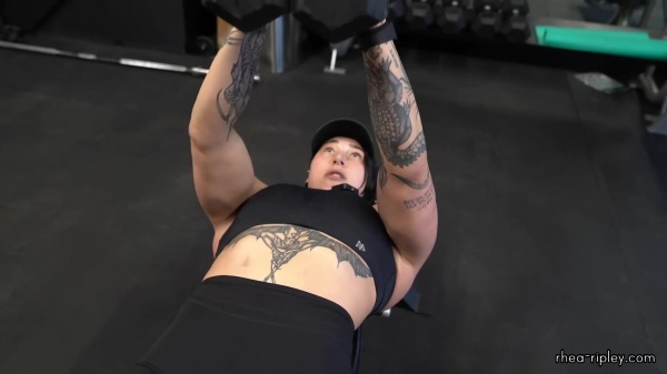 Rhea_Ripley_flexes_on_Sheamus_with_her__Nightmare__Arms_workout_3770.jpg